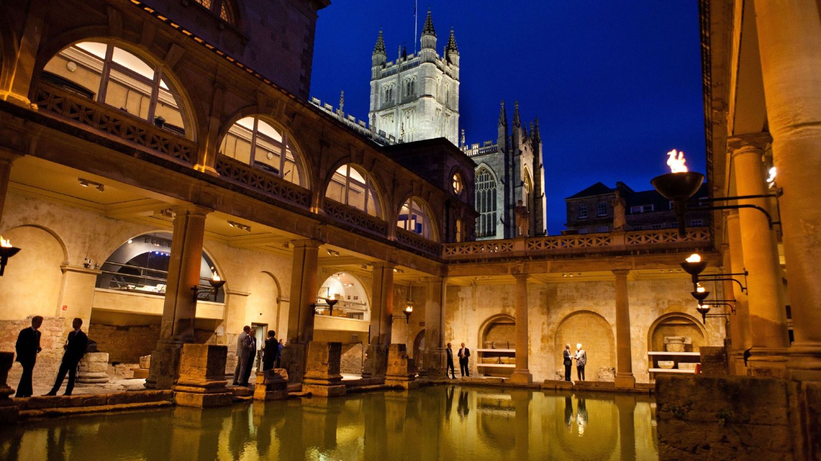 Event guests drinking by the Great Bath at the Roman Baths
